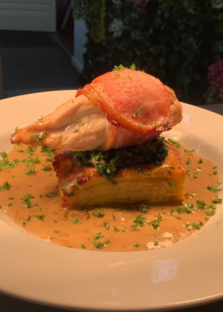 Featured image for “New special this week !!Bacon wrapped stuffed chicken breast with gratin spinach and garlic sauce #wp”