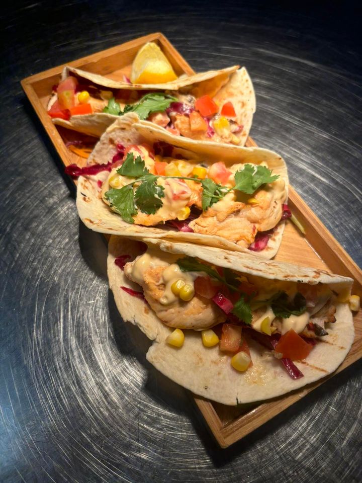 Featured image for “Looking for something to spice up your dining experience? Look no further than our new fish or chicken tacos!  These are the perfect entree for any meal experience”